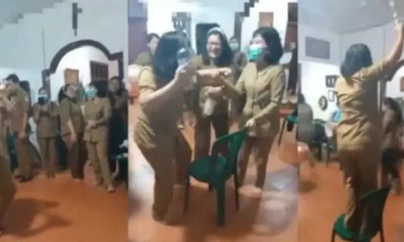 PNS wanita joget-joget pegang botol miras