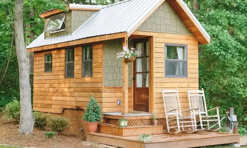 Desain rumah papan sederhana di desa (Foto: teenyabode.com)