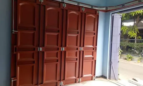 model pintu garasi besi lipat minimalis terbaru